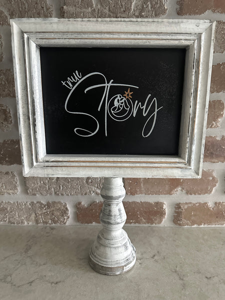 True Story Sign on Pedestal